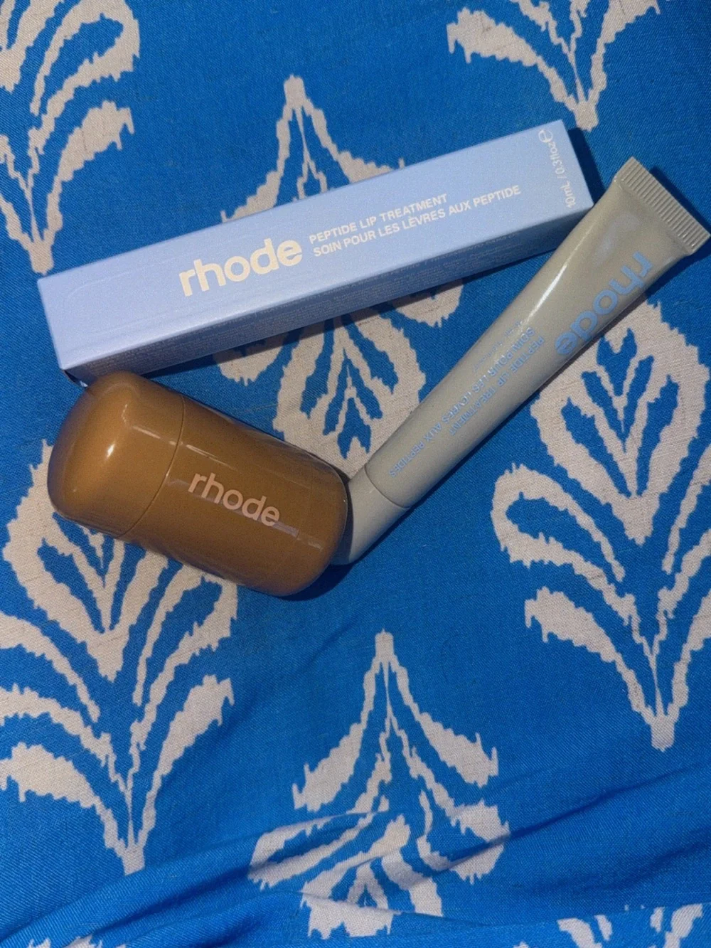 RHODE Peptide Lip Treatment with Beige Case and Light Blue Tube
